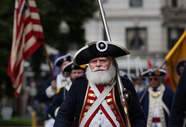 Scott Tourtellot,with the Sons of the American Revolution march during Ancient and Honorables 385th changing of the guard ceremony in Boston Staff Photo by Nancy Lane/Boston Herald (Monday,June 5, 2023). on the Boston Common on Monday, in Boston, MA. (Nancy Lane/Boston Herald) June 5, 2023